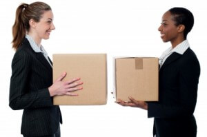 Girls holding boxes