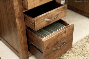 Moving file cabinets.
